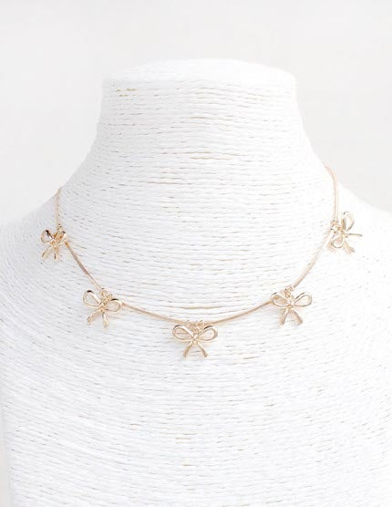Edi Gold Bow Necklace Meghan Browne